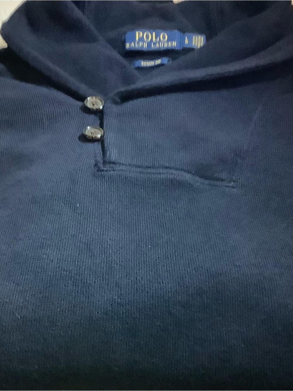 Polo by Ralph Lauren men’s shawl, collar button pullover.